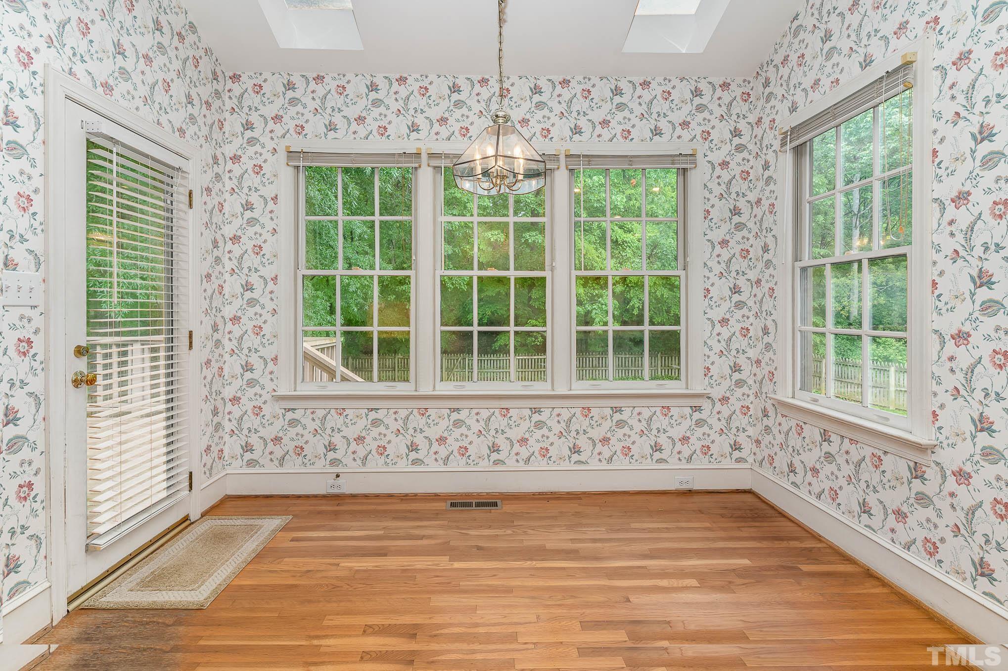 8121 Glenbrittle Way Raleigh, NC 27615 - Photo 13 of 35 a view of a room that has a large window