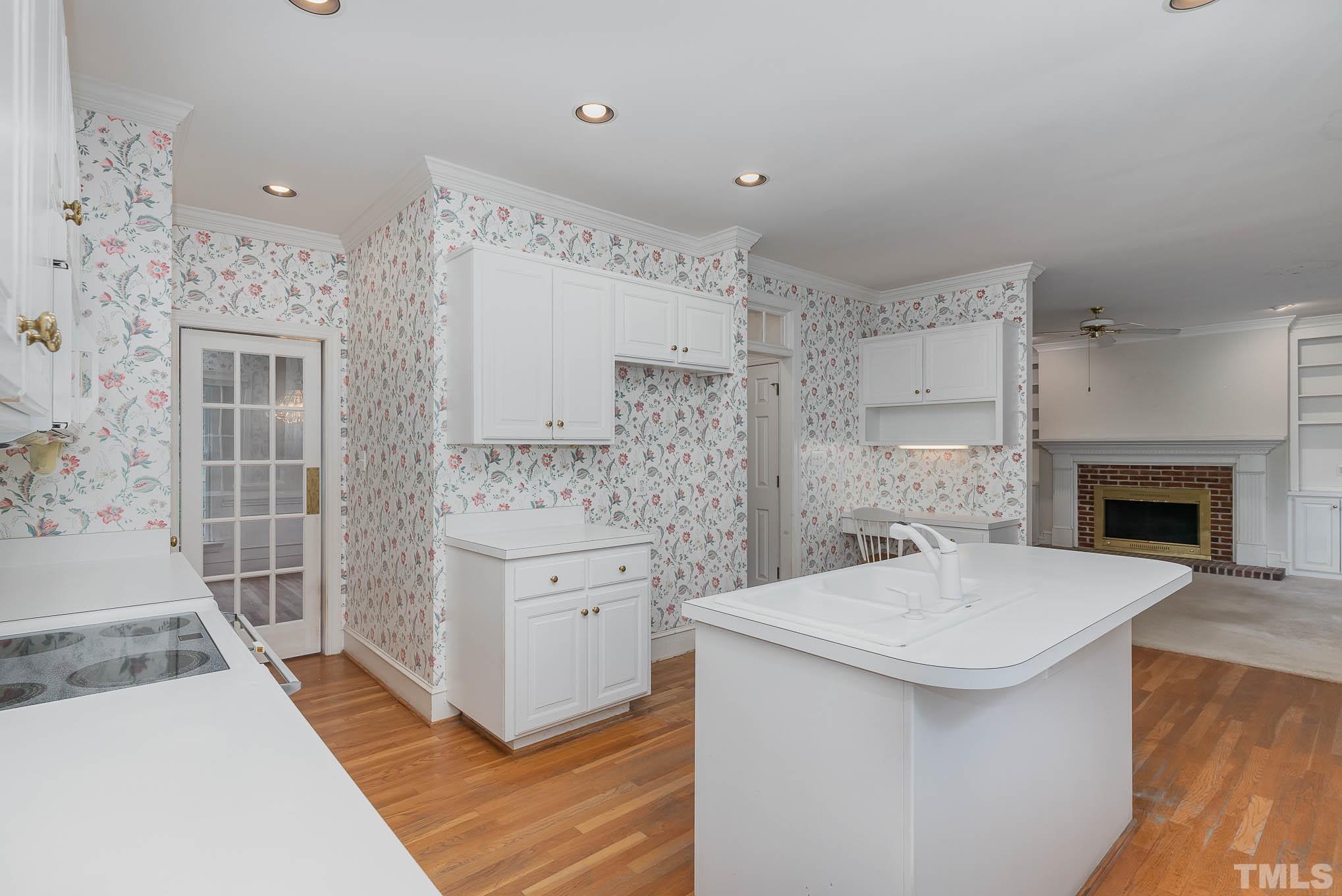 8121 Glenbrittle Way Raleigh, NC 27615 - Photo 16 of 35 a bathroom with a sink a toilet and shower