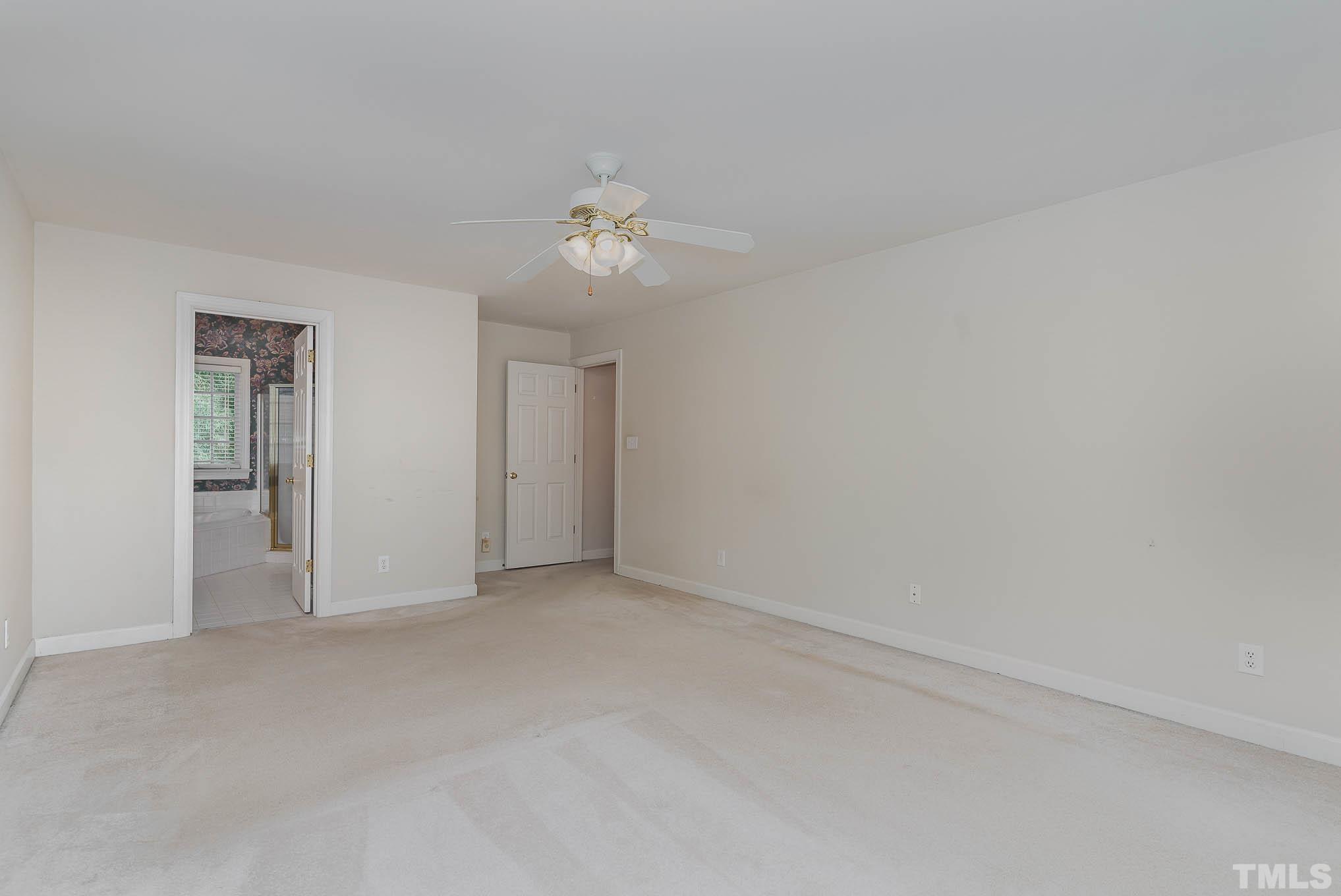 8121 Glenbrittle Way Raleigh, NC 27615 - Photo 19 of 35 wooden floor in an empty room
