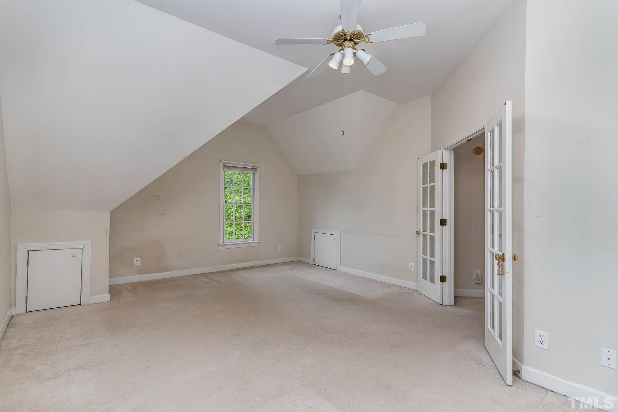 8121 Glenbrittle Way Raleigh, NC 27615 - Photo 23 of 35 a view of an empty room with a window