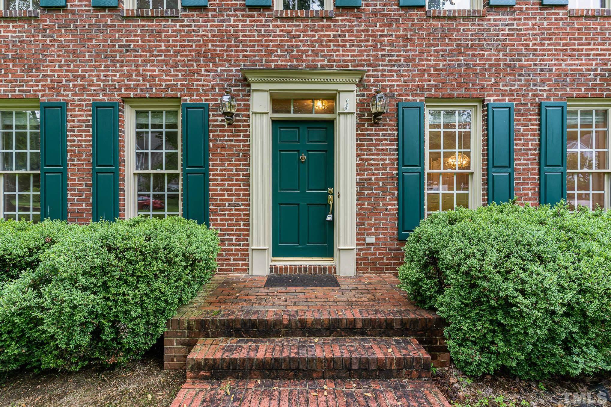 8121 Glenbrittle Way Raleigh, NC 27615 - Photo 3 of 35 a front view of a house
