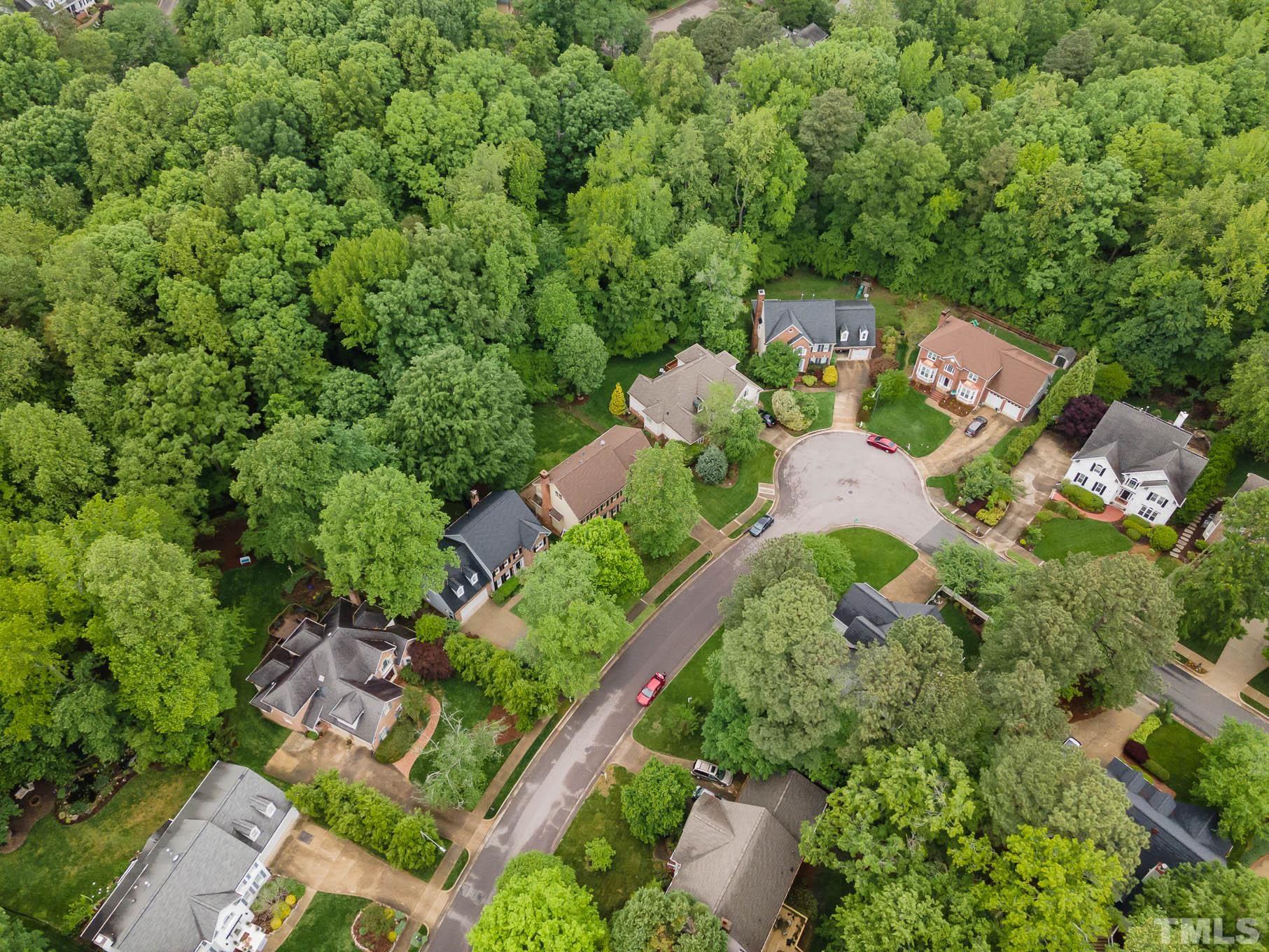 8121 Glenbrittle Way Raleigh, NC 27615 - Photo 33 of 35 an aerial view of a house with a yard