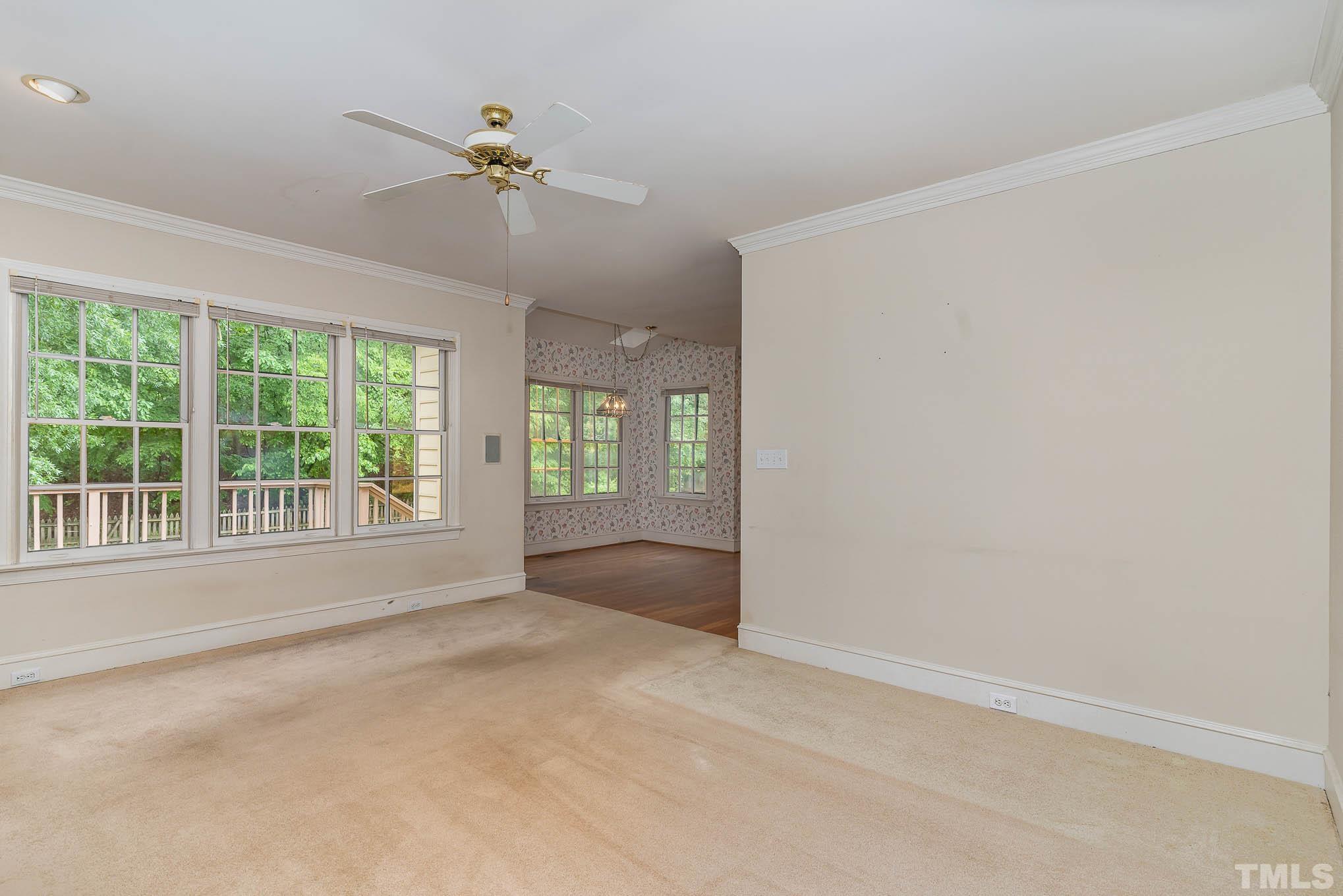 8121 Glenbrittle Way Raleigh, NC 27615 - Photo 10 of 35 a view of an empty room with a window