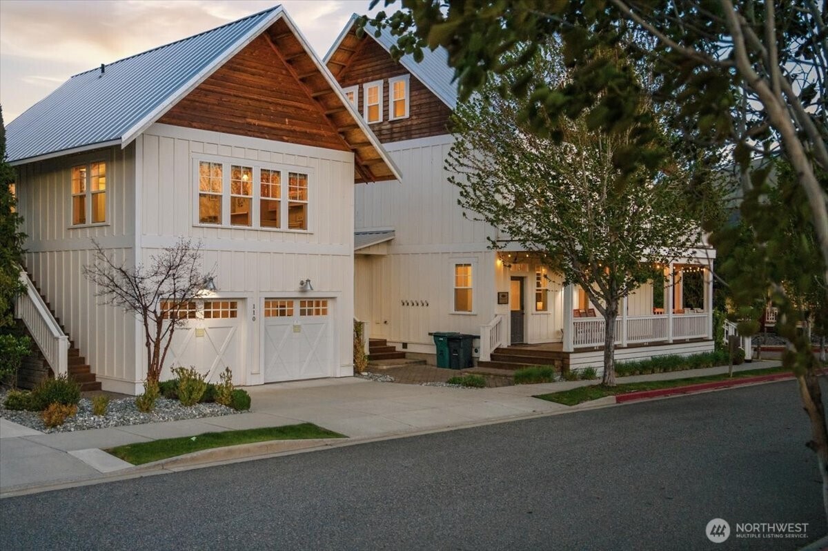 108 Jackrabbit Lane Chelan, WA 98816 - Photo 5 of 40 a view of a white house with a large tree