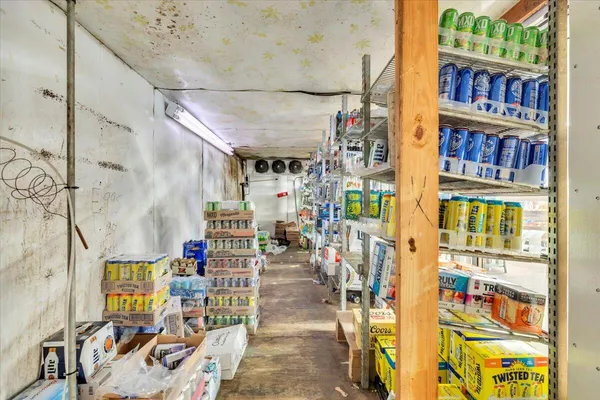 a view of a dining room with furniture wooden floor and a rug