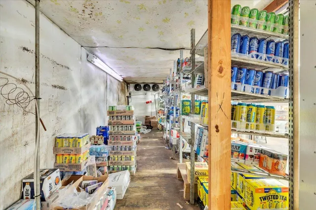 a view of a dining room with furniture wooden floor and a rug
