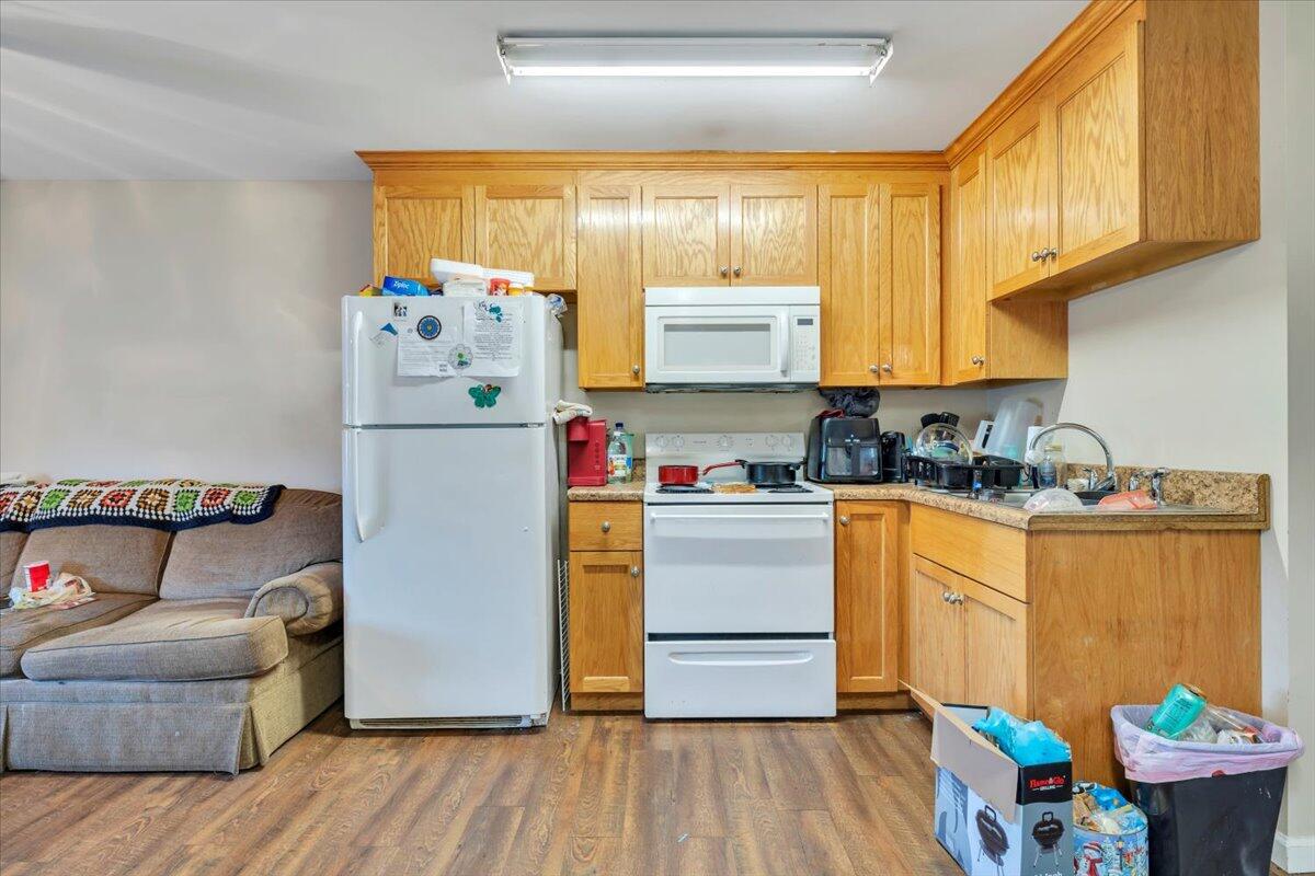 14189 Franklin Street Ferrum, VA 24088 - Photo 59 of 95 a kitchen with a refrigerator and a stove top oven