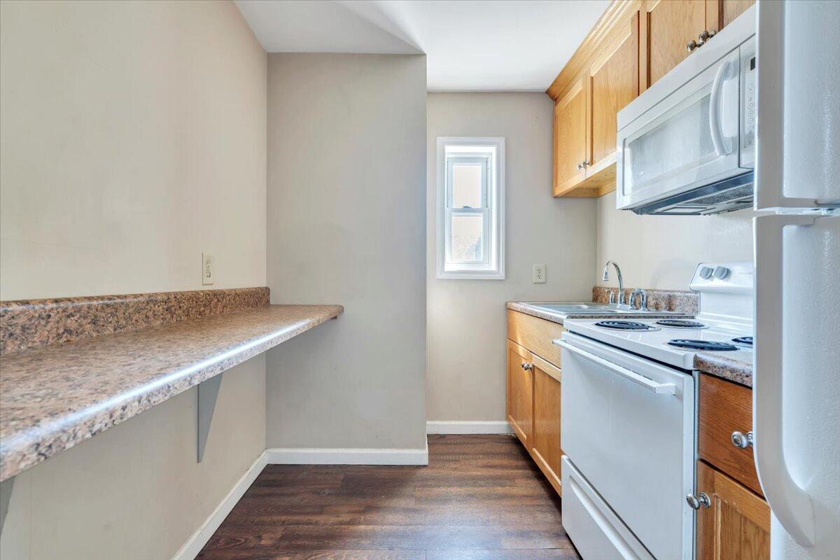 14189 Franklin Street Ferrum, VA 24088 - Photo 74 of 95 a kitchen with stainless steel appliances granite countertop a sink and a stove