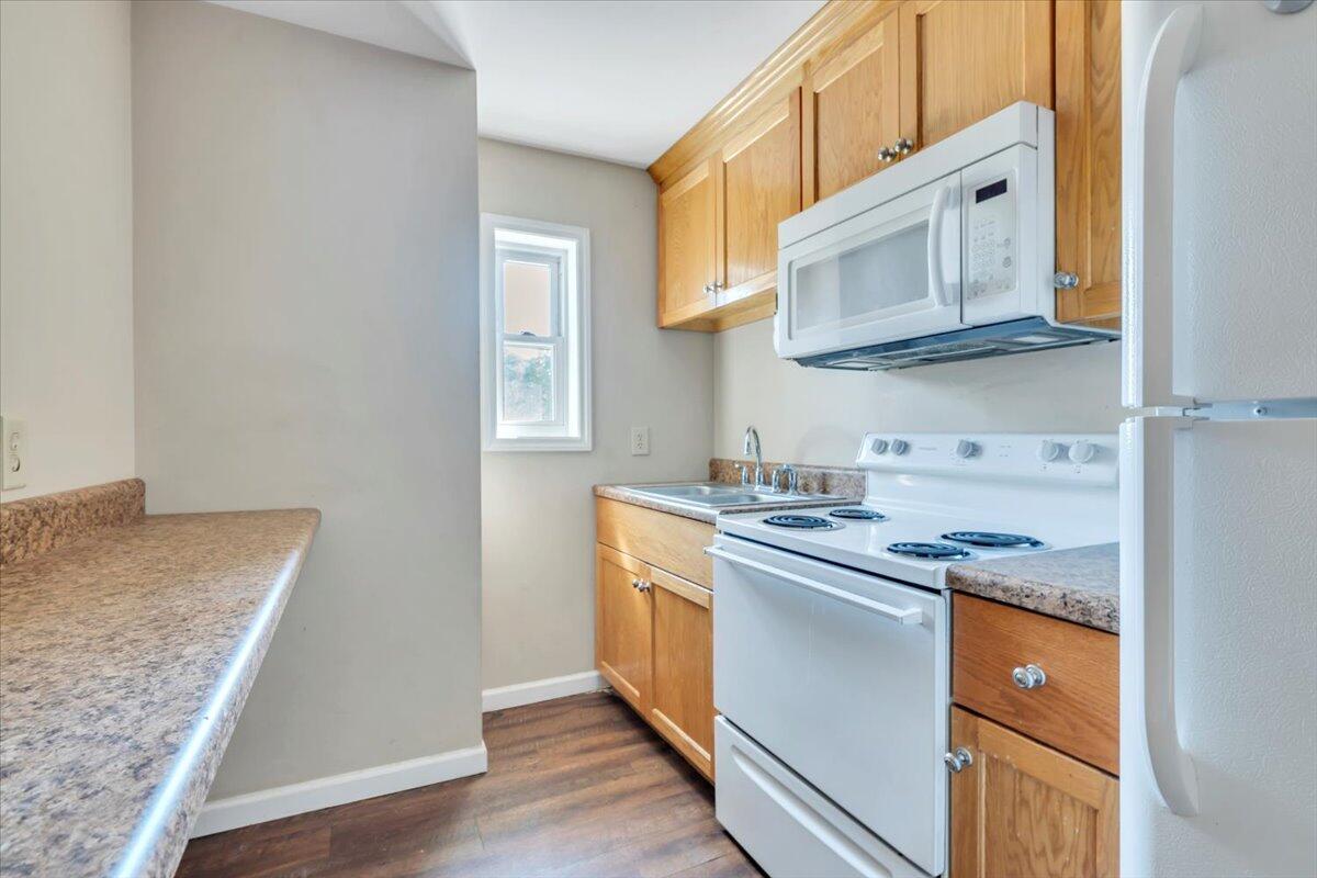 14189 Franklin Street Ferrum, VA 24088 - Photo 75 of 95 a kitchen with stainless steel appliances granite countertop a sink and a stove