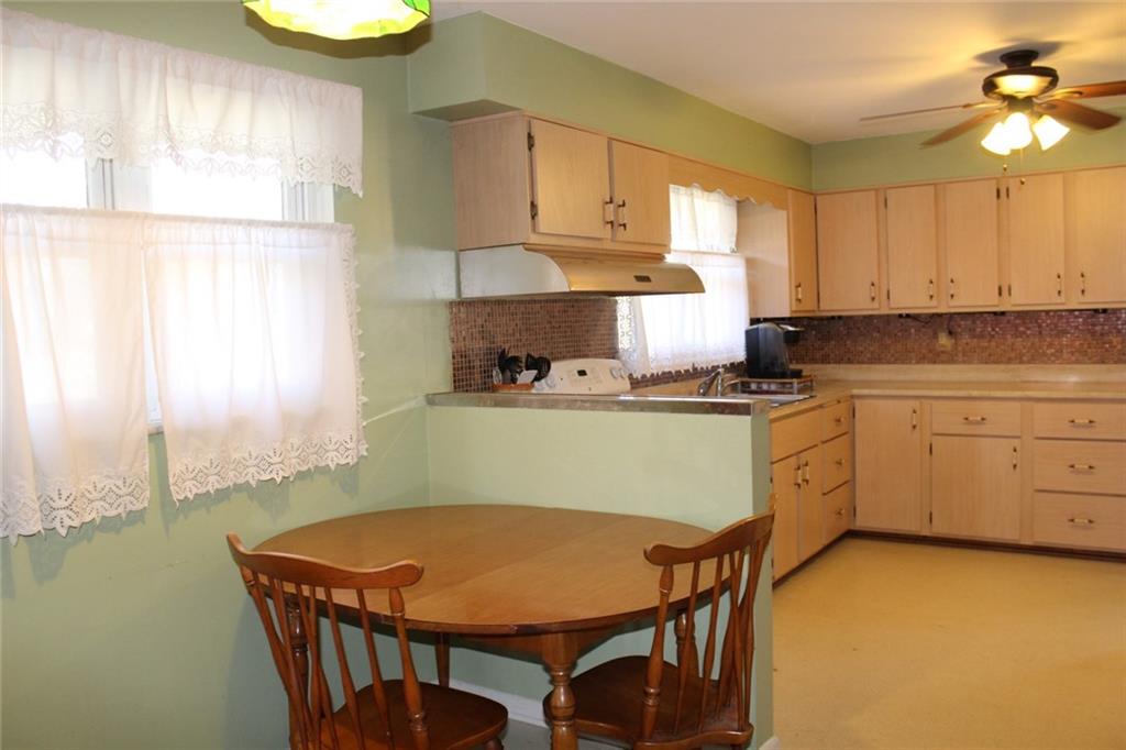 2050 Ridge Rd Extension Ambridge, PA 15003 - Photo 4 of 8 You will appreciate the fully equipped eat-in kitchen with plenty of counter space.