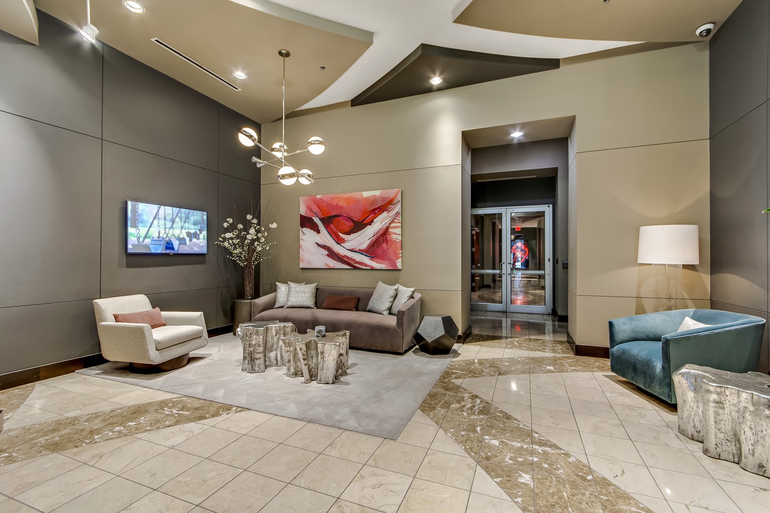 360 Nueces Street, Unit 1417 Austin, TX 78701 - Photo 28 of 39 a living room with furniture and a chandelier