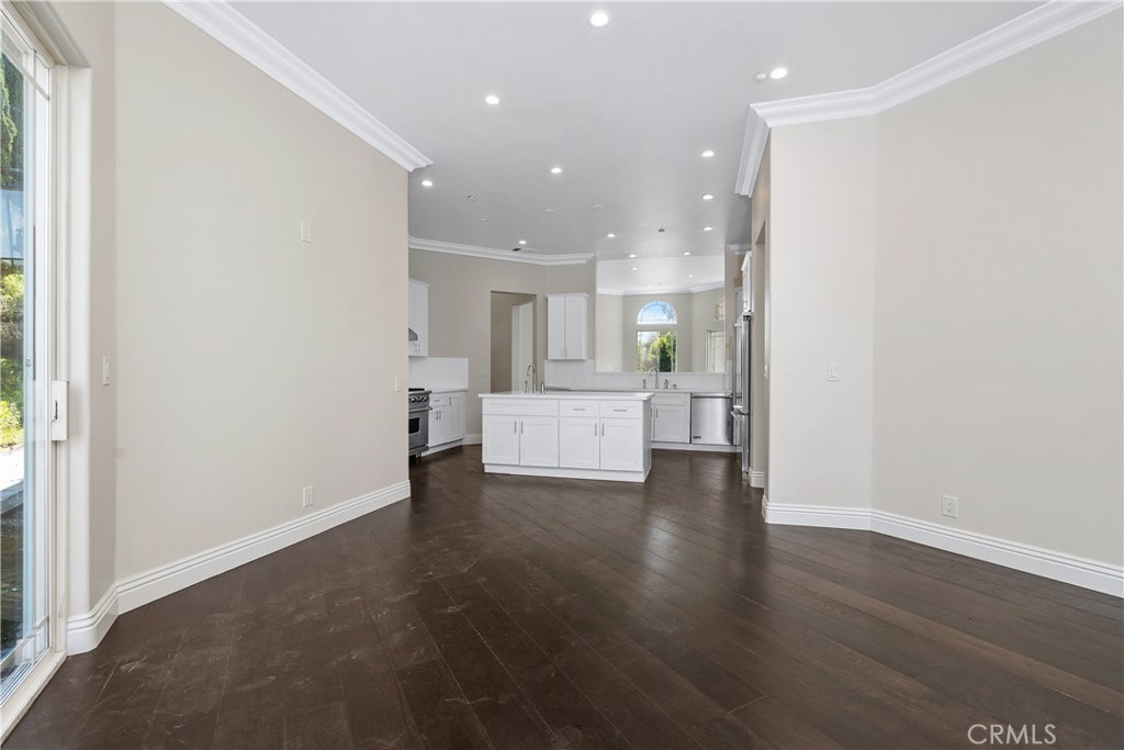 166 Dapplegray Road Bell Canyon, CA 91307 - Photo 16 of 57 a view of a kitchen with a refrigerator and a window