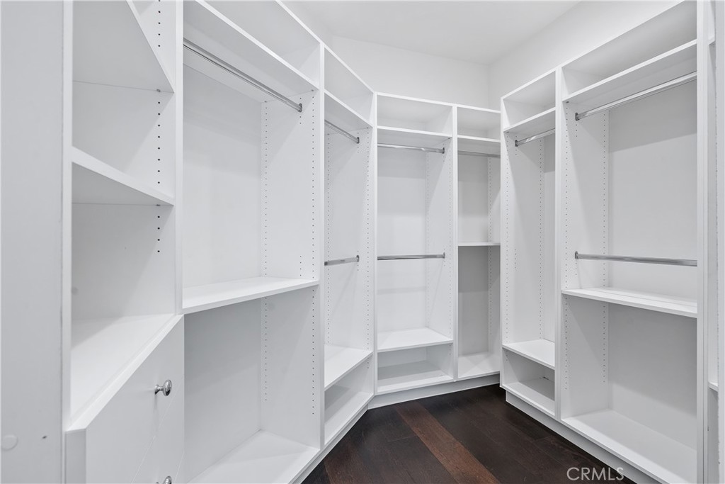 166 Dapplegray Road Bell Canyon, CA 91307 - Photo 26 of 57 a view of walk in closet with empty racks