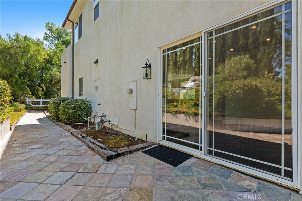166 Dapplegray Road Bell Canyon, CA 91307 - Photo 45 of 57 a view of a door and chair in a room