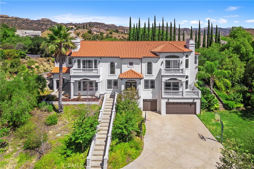 166 Dapplegray Road Bell Canyon, CA 91307 - Photo 46 of 57 a front view of a house with a yard