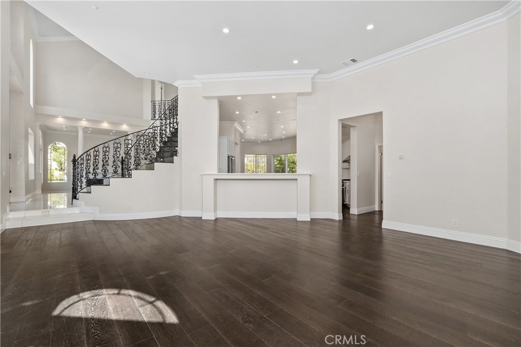 166 Dapplegray Road Bell Canyon, CA 91307 - Photo 9 of 57 a view of a hallway with wooden floor and windows