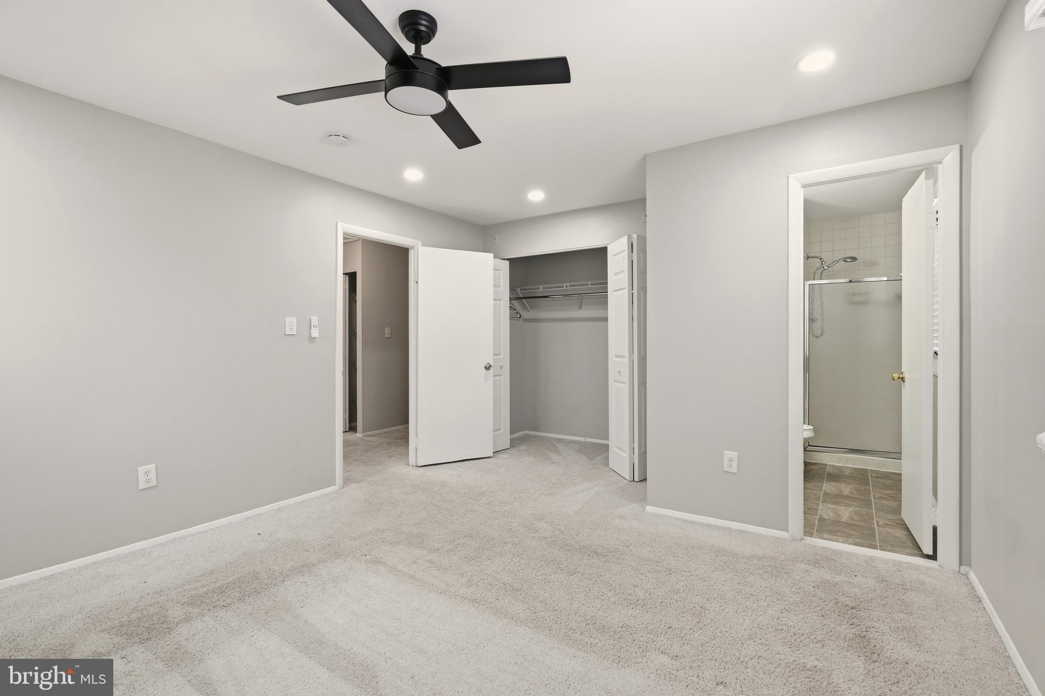 7712 Erica Lane Laurel, MD 20707 - Photo 18 of 35 a view of an empty room and chandelier fan