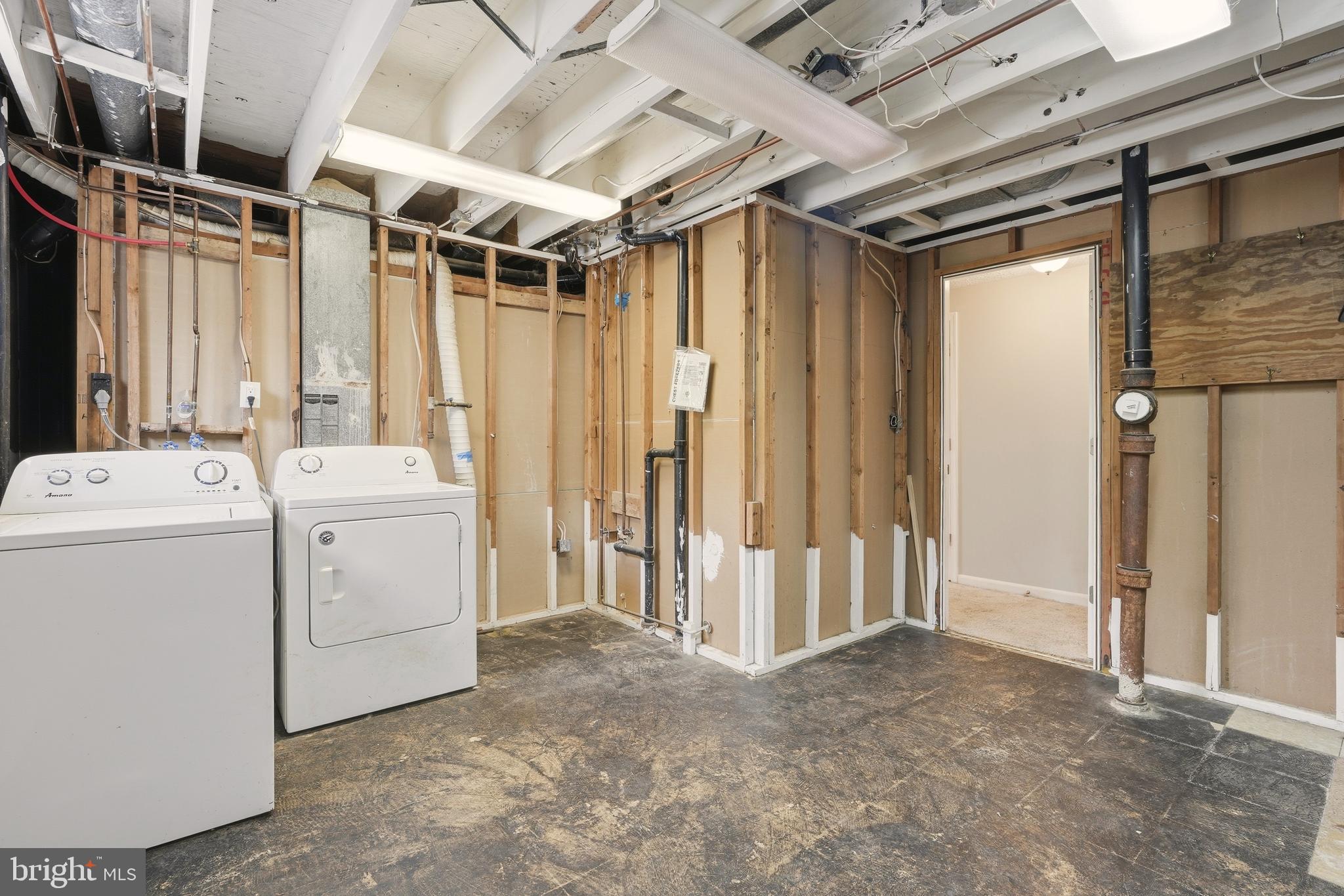 7712 Erica Lane Laurel, MD 20707 - Photo 28 of 35 a utility room with dryer and washer