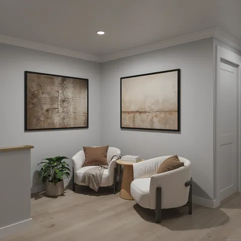 a room with furniture and a potted plant