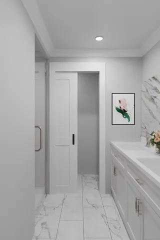 a bathroom with a sink a toilet and mirror