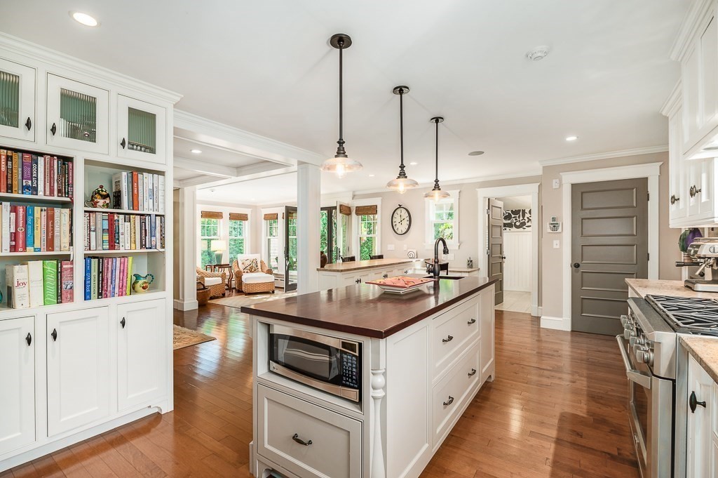 3 Grapevine Road Gloucester, MA 01930 - Photo 12 of 32 a kitchen with a stove and cabinets