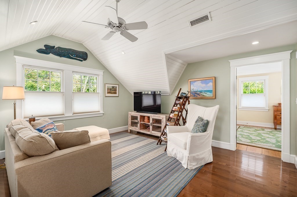 3 Grapevine Road Gloucester, MA 01930 - Photo 16 of 32 a living room with furniture and a flat screen tv