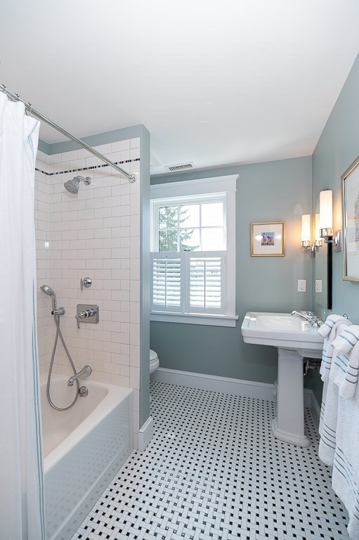 3 Grapevine Road Gloucester, MA 01930 - Photo 23 of 32 a bathroom with a sink toilet and shower
