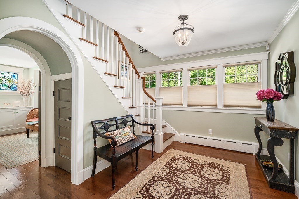 3 Grapevine Road Gloucester, MA 01930 - Photo 3 of 32 a view of an entryway with wooden floor and a rug