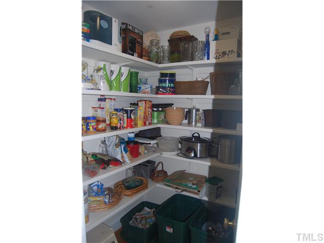 335 Pine Ridge Road Zebulon, NC 27597 - Photo 14 of 25 Walk-in Butler's Pantry off the Kitchen. Wow!