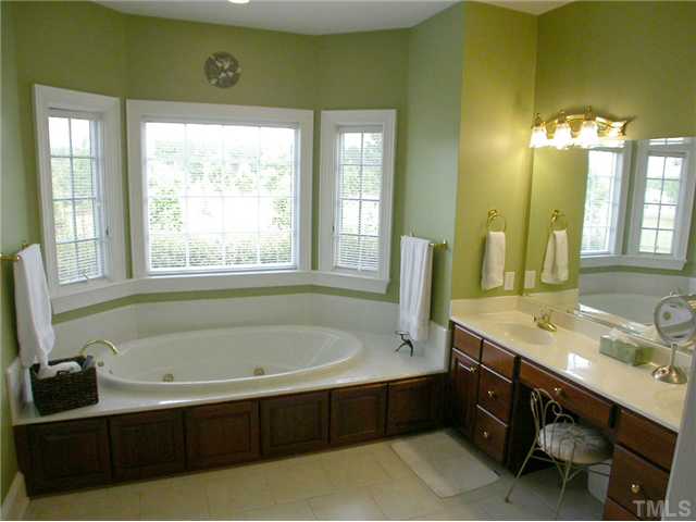 335 Pine Ridge Road Zebulon, NC 27597 - Photo 17 of 25 View of Jacuzzi Tub and Double Vanites in the Master Bath