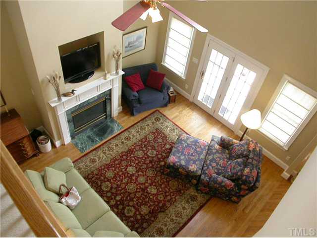 335 Pine Ridge Road Zebulon, NC 27597 - Photo 6 of 25 Two Story Living Room with Gas Log Fireplace and Hardwood Floors