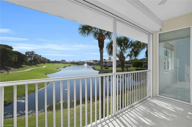 a view of a city street from a balcony