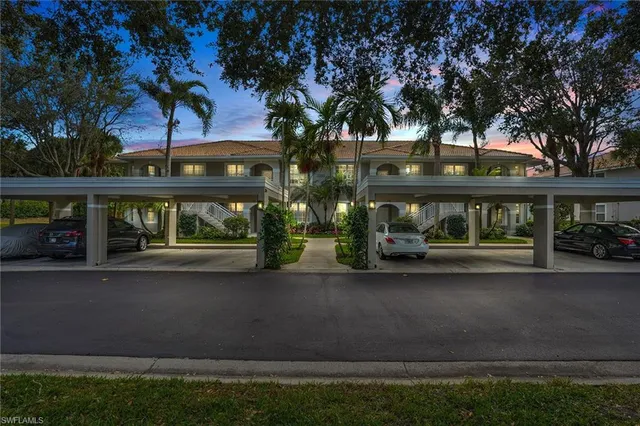 a front view of building with street