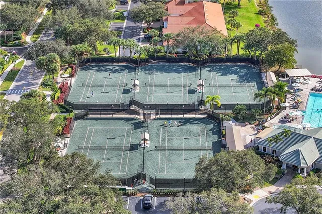 a aerial view of a house with a yard