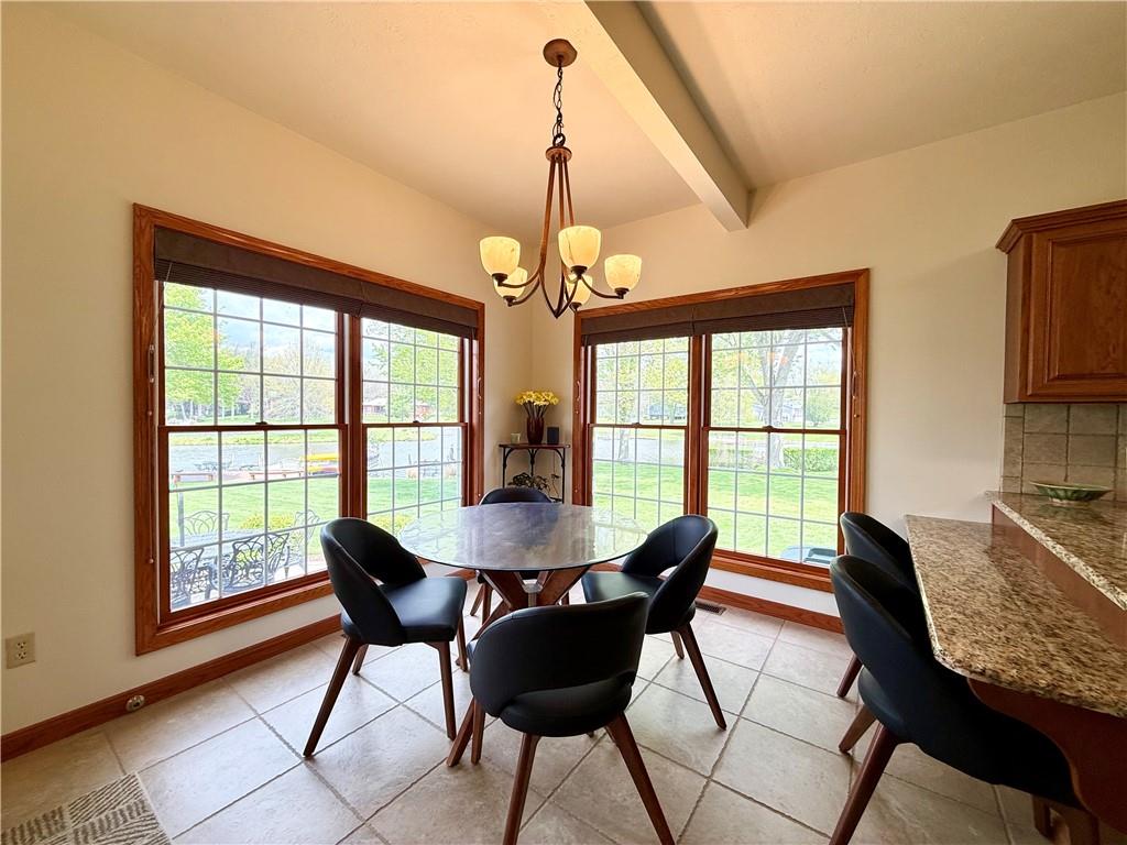 334 Manito Trail Mercer, PA 16137 - Photo 14 of 49 a dining room with furniture a chandelier and wooden floor
