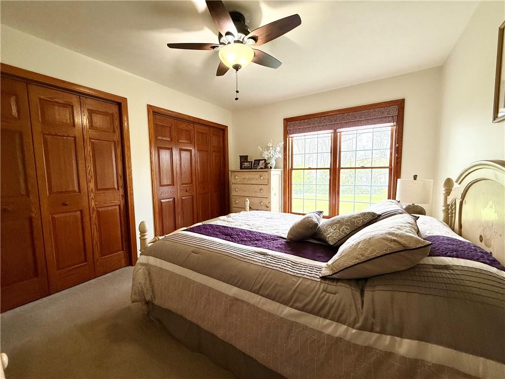 334 Manito Trail Mercer, PA 16137 - Photo 23 of 49 a bedroom with a bed and window