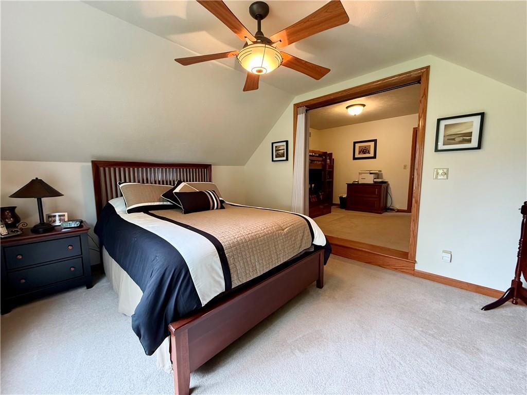 334 Manito Trail Mercer, PA 16137 - Photo 28 of 49 a bedroom with a bed and ceiling fan