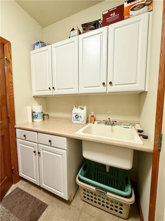 334 Manito Trail Mercer, PA 16137 - Photo 38 of 49 a kitchen with a sink a stove and cabinets