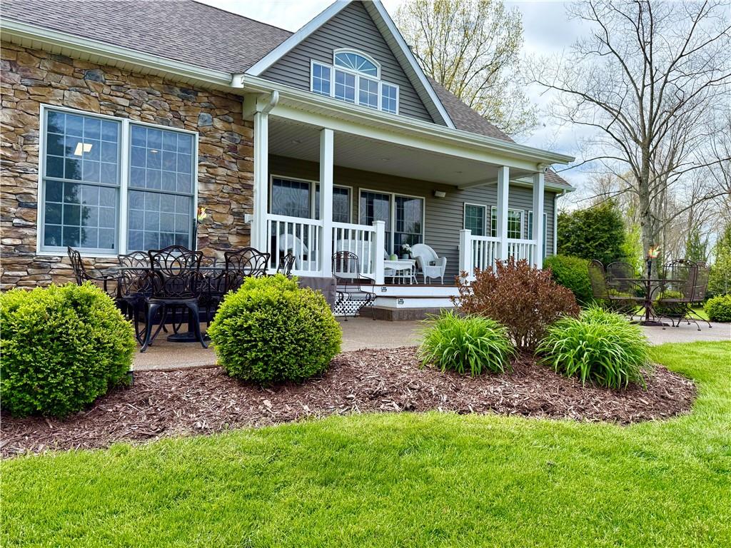 334 Manito Trail Mercer, PA 16137 - Photo 41 of 49 a front view of a house with garden