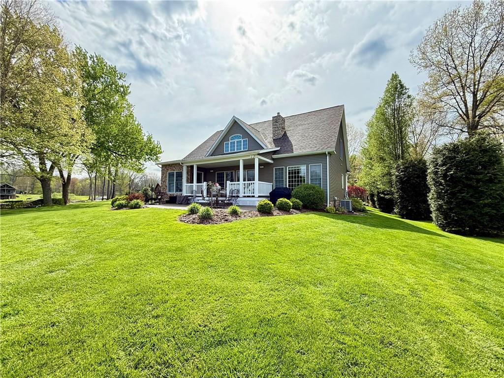 334 Manito Trail Mercer, PA 16137 - Photo 45 of 49 a front view of a house with yard and green space