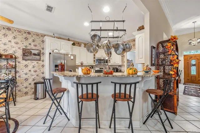 a view of a dining room with furniture