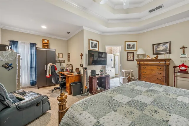 a bedroom with a bed and furniture