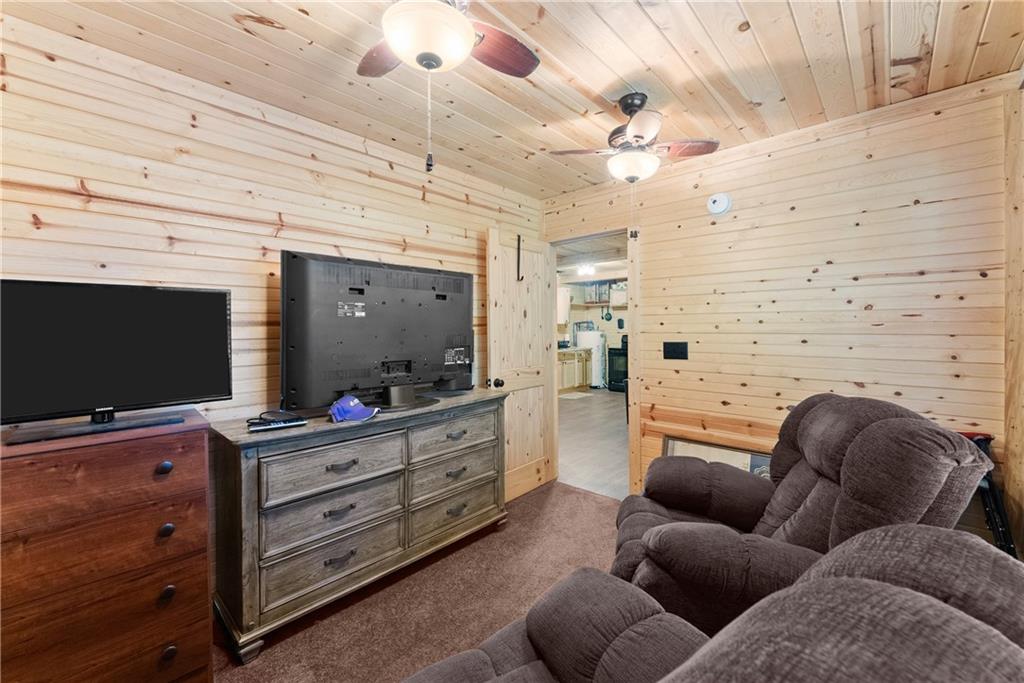 318 Jim Grizzle Road Royston, GA 30662 - Photo 18 of 56 a livingroom with furniture and a flat screen tv