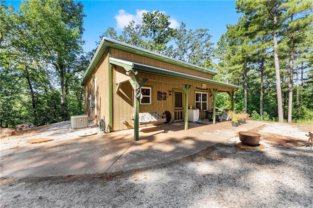 318 Jim Grizzle Road Royston, GA 30662 - Photo 3 of 56 a view of a house with backyard and sitting area