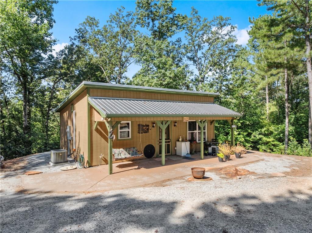 318 Jim Grizzle Road Royston, GA 30662 - Photo 6 of 56 a view of a house with backyard and sitting area