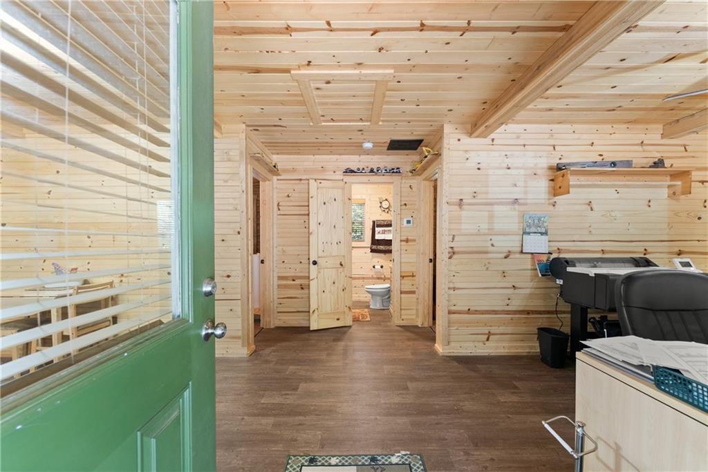 318 Jim Grizzle Road Royston, GA 30662 - Photo 7 of 56 a view of empty room with wooden floor