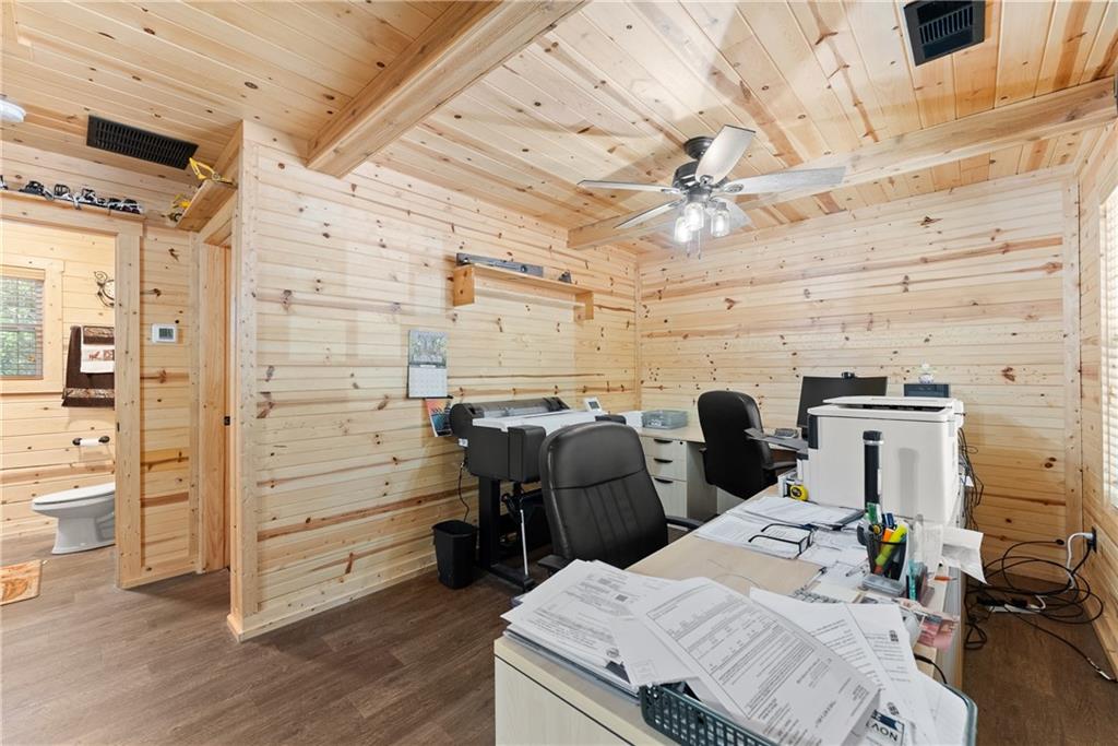 318 Jim Grizzle Road Royston, GA 30662 - Photo 8 of 56 a bed room with a bed and furniture