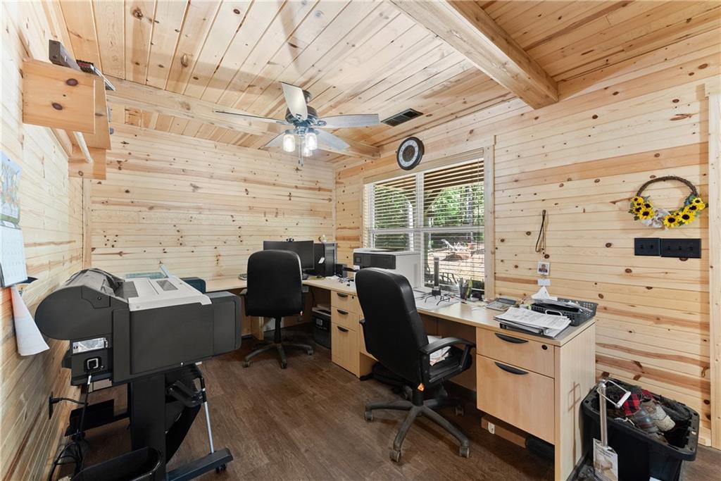 318 Jim Grizzle Road Royston, GA 30662 - Photo 9 of 56 a view of a workspace with furniture and a window