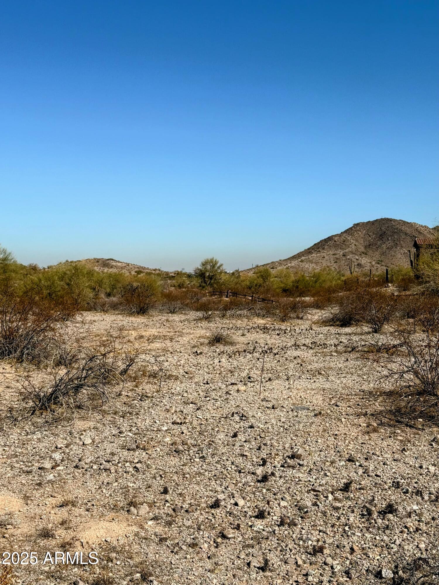 8564 San Filipe Drive, Unit 4 Goodyear, AZ 85338 - Photo 8 of 15 a view of ocean and mountain