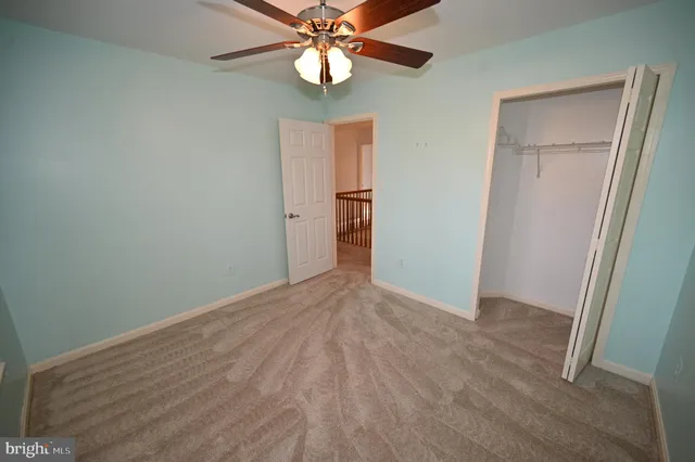 a view of a backyard with pathway